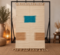 Tapis Zanafi écru – Bleu canard et camel 150×245 cm – 100 % laine – Pièce unique